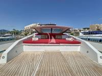 FIGI yacht charter: Bow sunbathing with Bimini