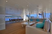 MEIRA yacht charter: Meira top deck dining and seating area looking aft