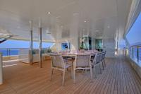 MEIRA yacht charter: Meira top deck dining and seating area looking forward